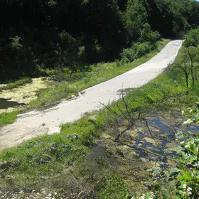 National road on waste dump